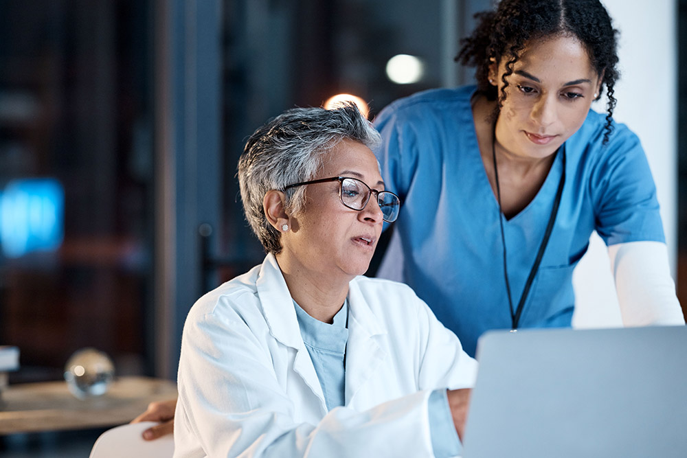 researchers searching on a computer